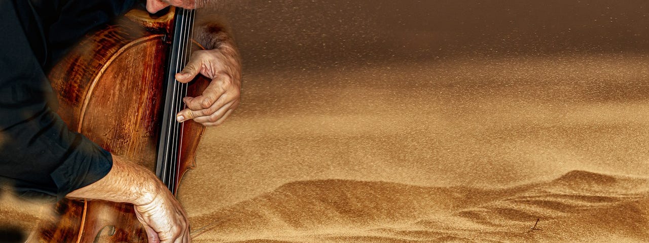 A man playing a cello, superimposed over a windy sandstorm in the desert.