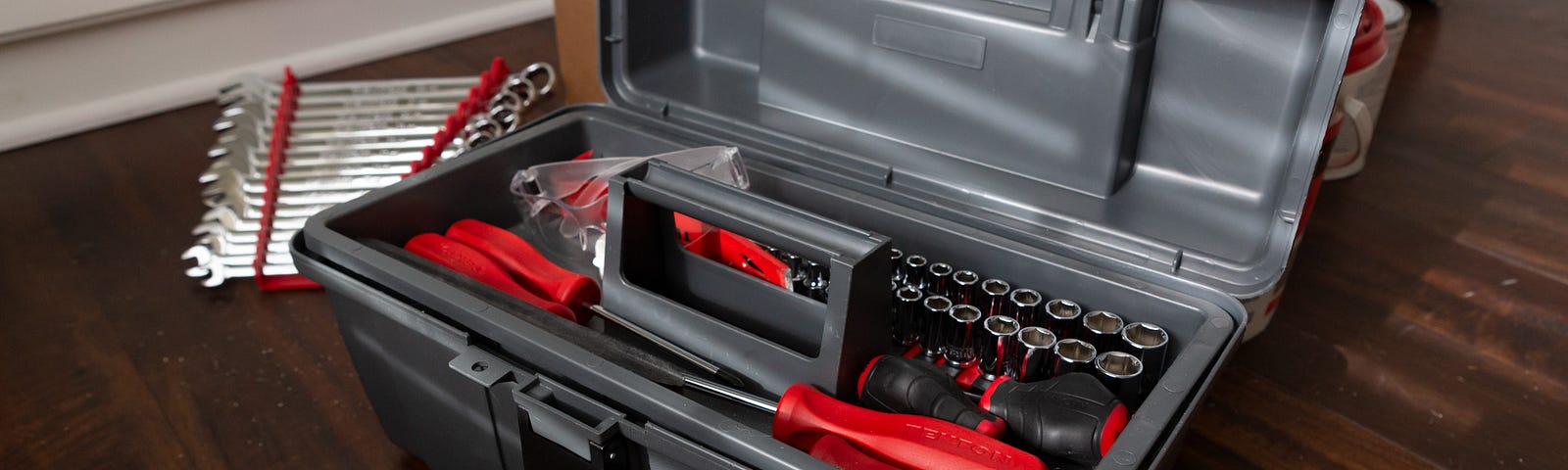 An open tool box showing some tools