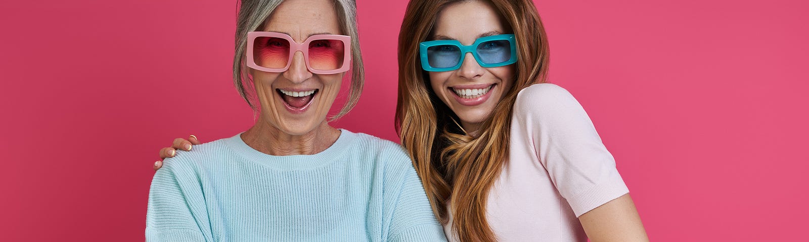 Senior and younger woman looking cool in fancy sunlasses