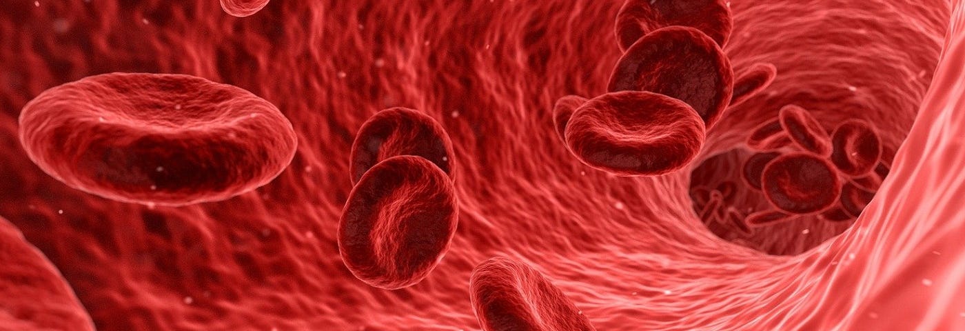 Photo on blood cells in the bloodstream relating to COVID-19 infection based on blood type.