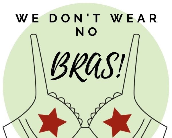 Image of a bra with text saying “we don’t wear no bras!”