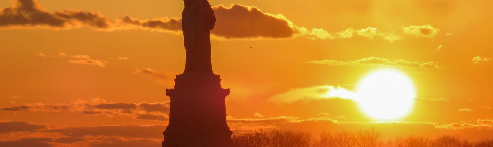 The Statue of Liberty at Sunrise.