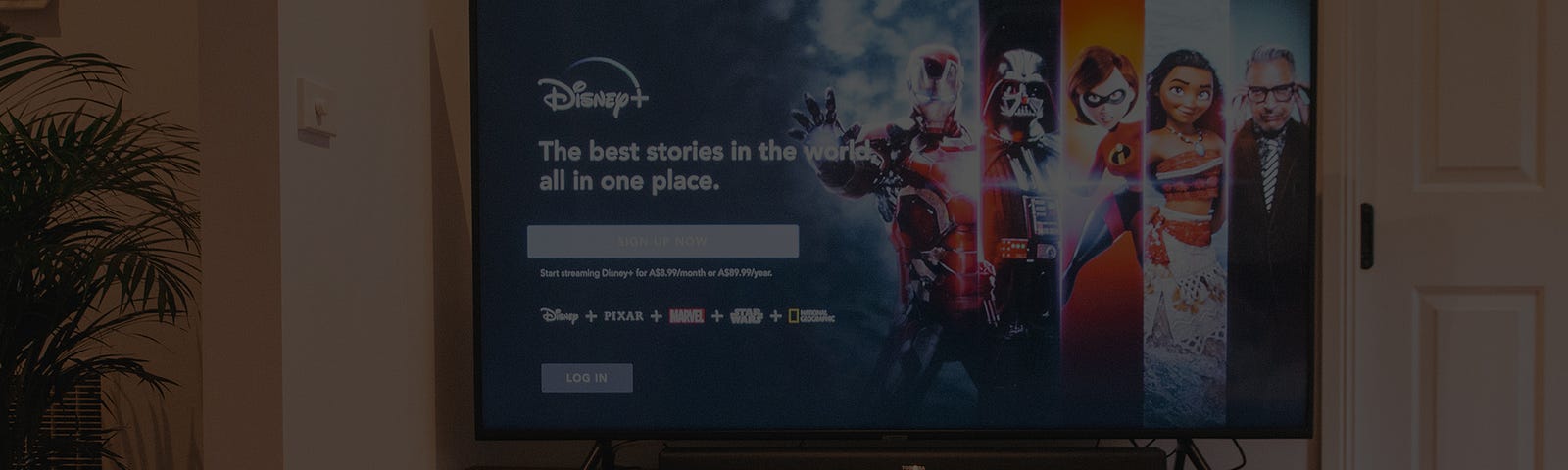 A living room TV turned on to Disney+.