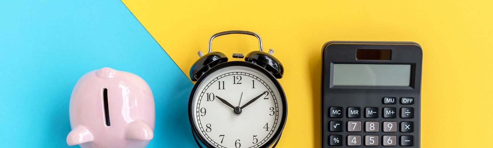 A piggy bank, a clock, and a calculator.