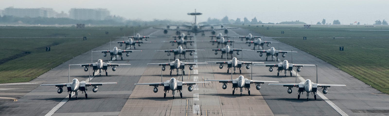 Fully armed aircraft from the 18th Wing conduct an elephant walk during an exercise at Kadena Air Base, Japan, April 12, 2017. Photo by SrA John Linzmeier/U.S. Air Force