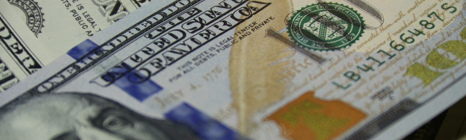 IMAGE: A closeup of a hundred dollars bill
