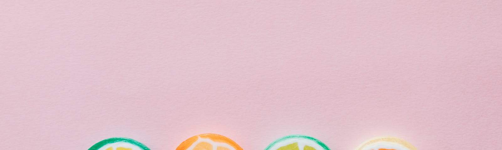 Four colorful lollipops