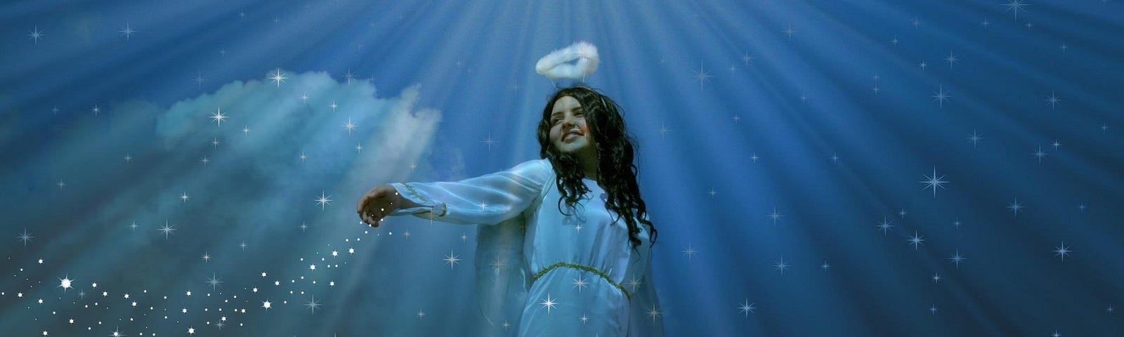 Woman in angelic garb, halo above her head, rays of light beaming all around her wiht blue background.