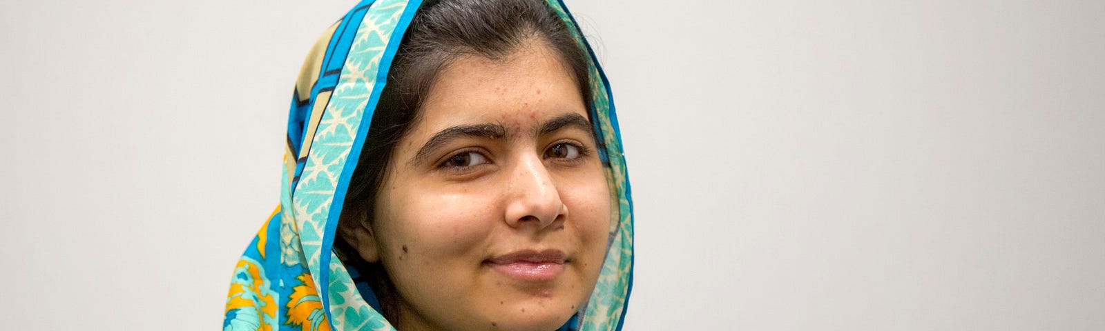 Malala dressed beautifully in colorful attire