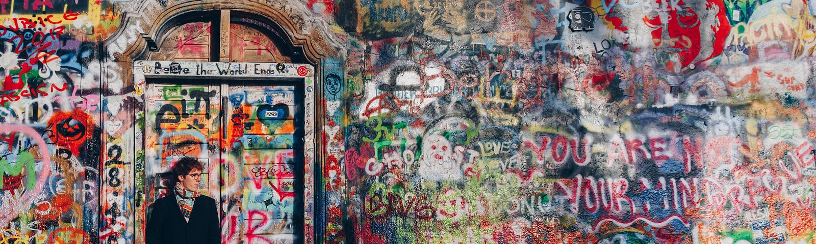“Once a normal wall, since the 1980s it has been filled with John Lennon-inspired graffiti and pieces of lyrics from Beatles’ songs.”