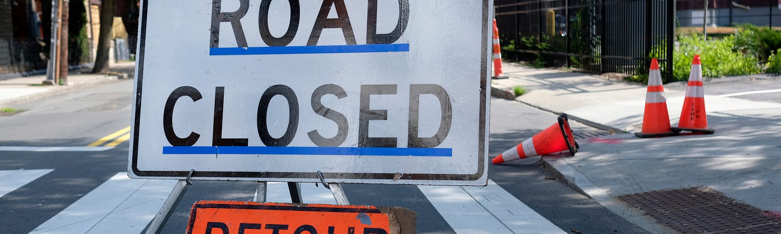 detour sign to represent last minute changes and how each generation would handle them in work and in life on the road.