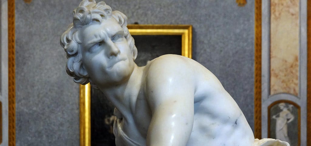 Image by Steven Zucker, from Flickr, Creative Commons License 2.0. https://creativecommons.org/licenses/by-nc-sa/2.0/. Statue of David preparing to use his sling, by Gian Lorenzo Bernini.