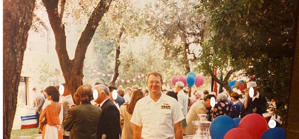 Navy Senior Chief in White Uniform at a 4th of July Party in France.