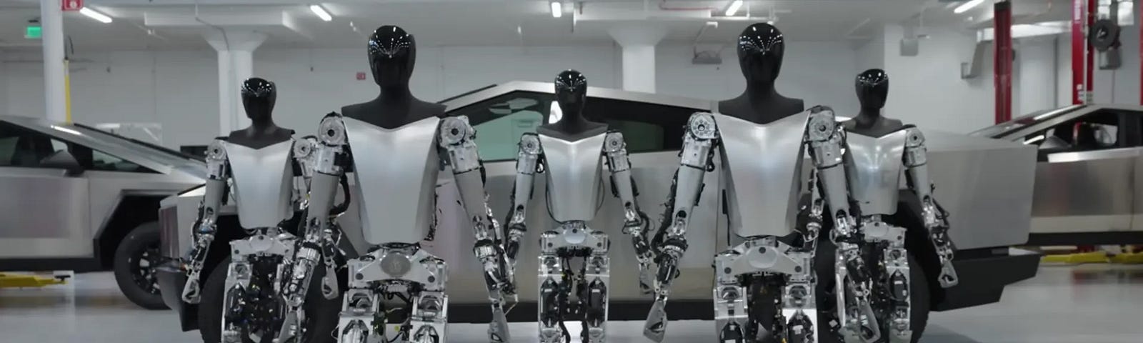 IMAGE: Five Optimus robots in front of a Tesla Cybertruck