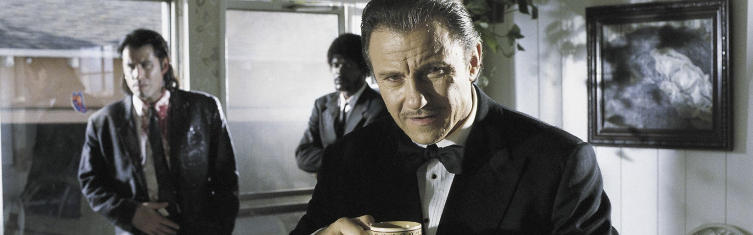 Harvey Keitel as The Wolf in Pulp Fiction arrives at the scene dressed in a tuxedo to mop up the carnage.