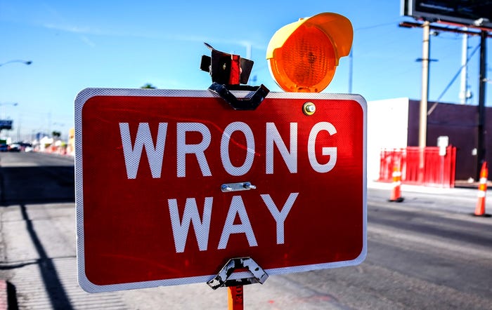 Road construction sign reading Wrong Way