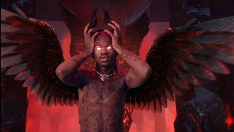 A still from the Montero music video of Lil Nas X, shirtless, with wings and glowing eyes, crowning himself king of hell.