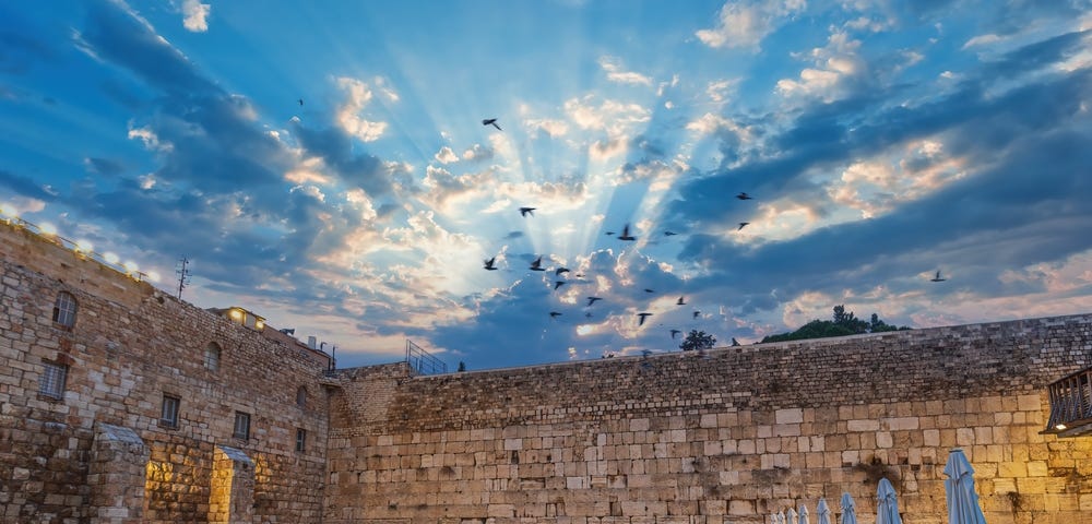 Beautiful sunrise at the Western Wall, which is the remnant of the Jewish Temple built by King Herod.