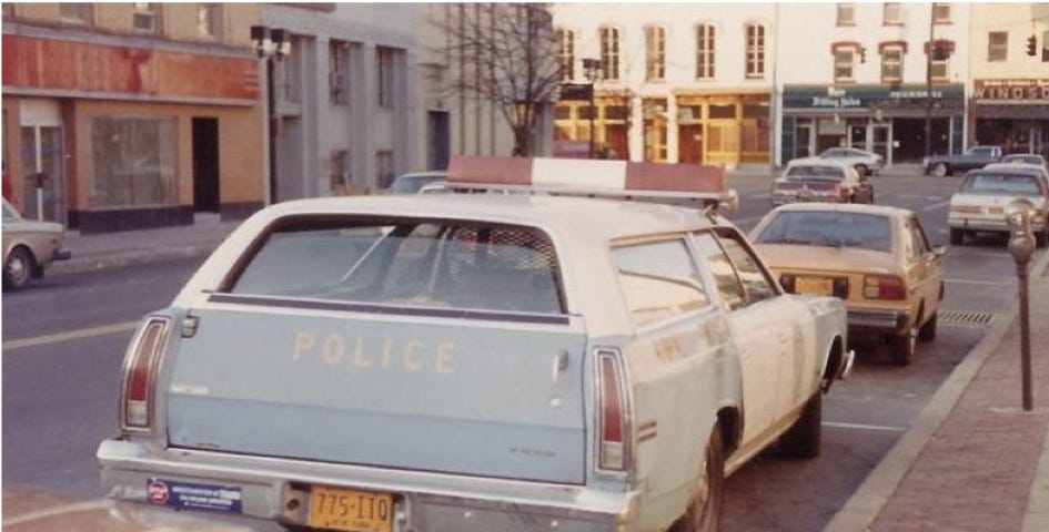 1970s Police Station Wagon parked on a street. Photo by author.
