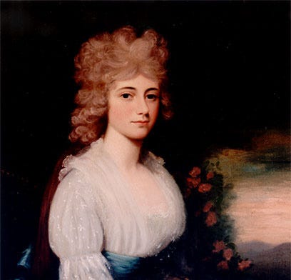 Louisa Adams in a muslin dress with a blue sash. Her ash-blonde hair is thick and curly.