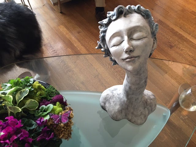Author’s photo of a sculpture of a woman’s head sitting on a table