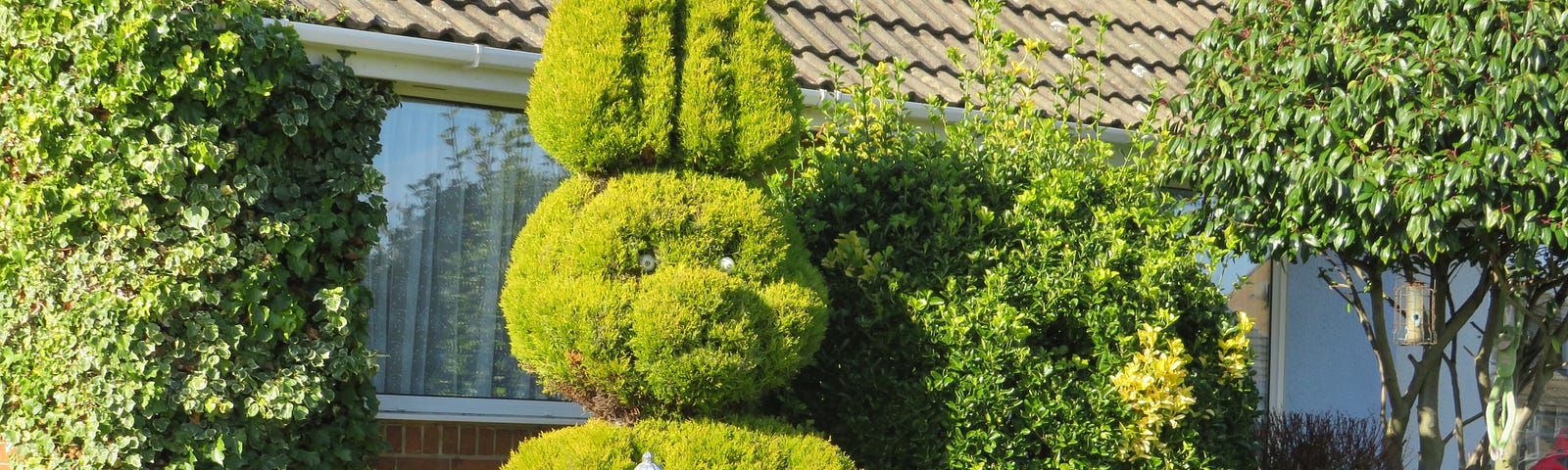 Topiary green bunny — and friend