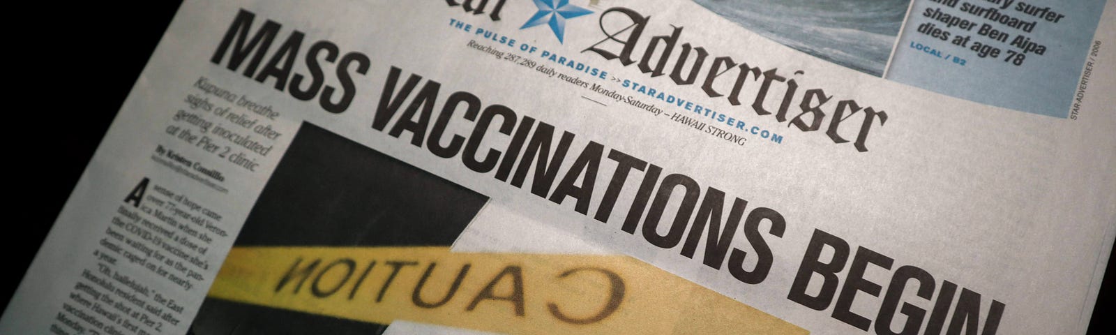Star newspaper stating: Mass Vaccinations Begin