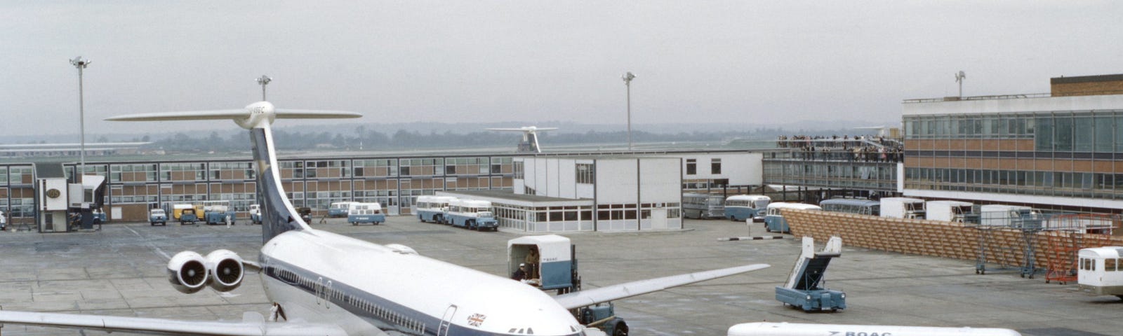 BOAC VC-10 passenger aircraft loading baggage and passengers.