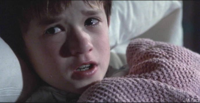 IMAGE: A well known scene turned into meme from the movie “The Sixth Sense” with the actor Haley Joel Osment tucked in bed saying “I see dead people”