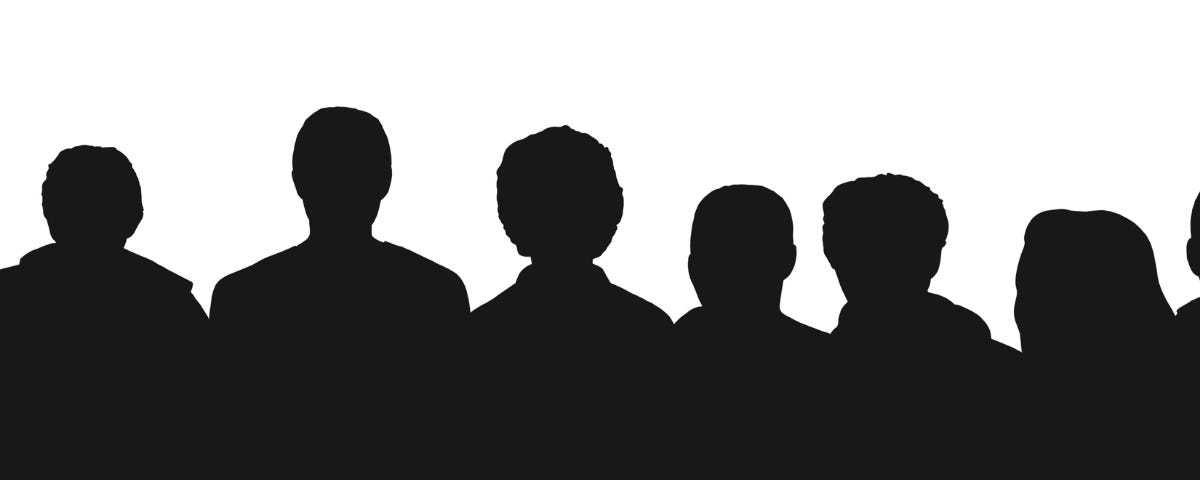 A group of peoples shadows standing in an audience