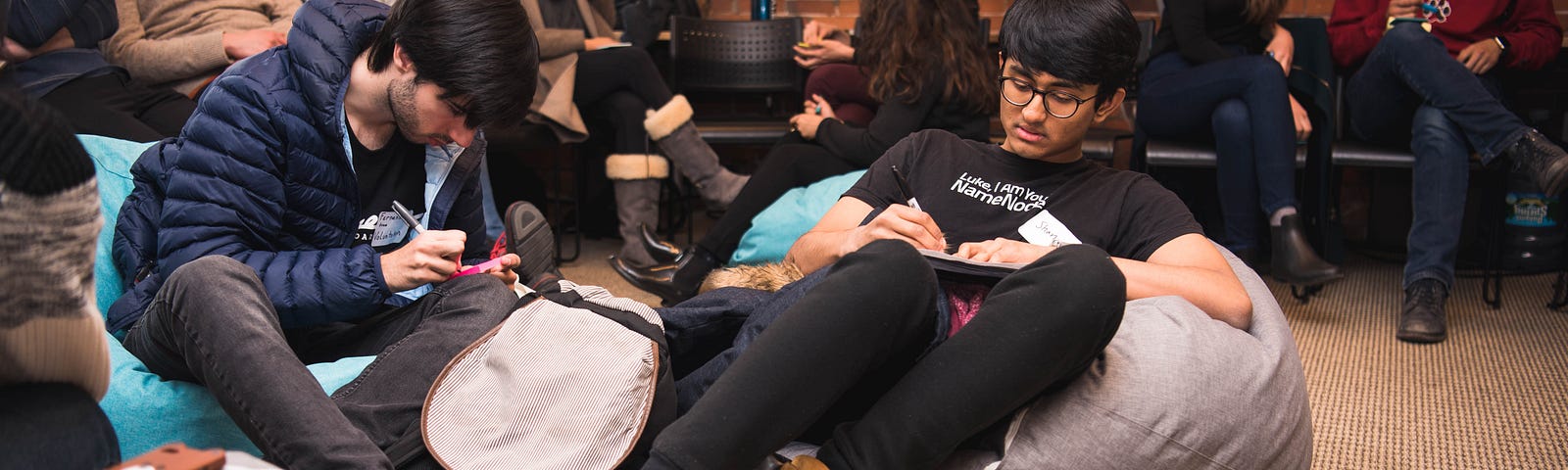 Students sit on beanbags and brainstorm