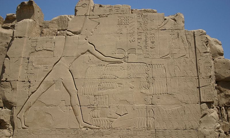 Pharaoh Thutmose punishing Canaanite capitves