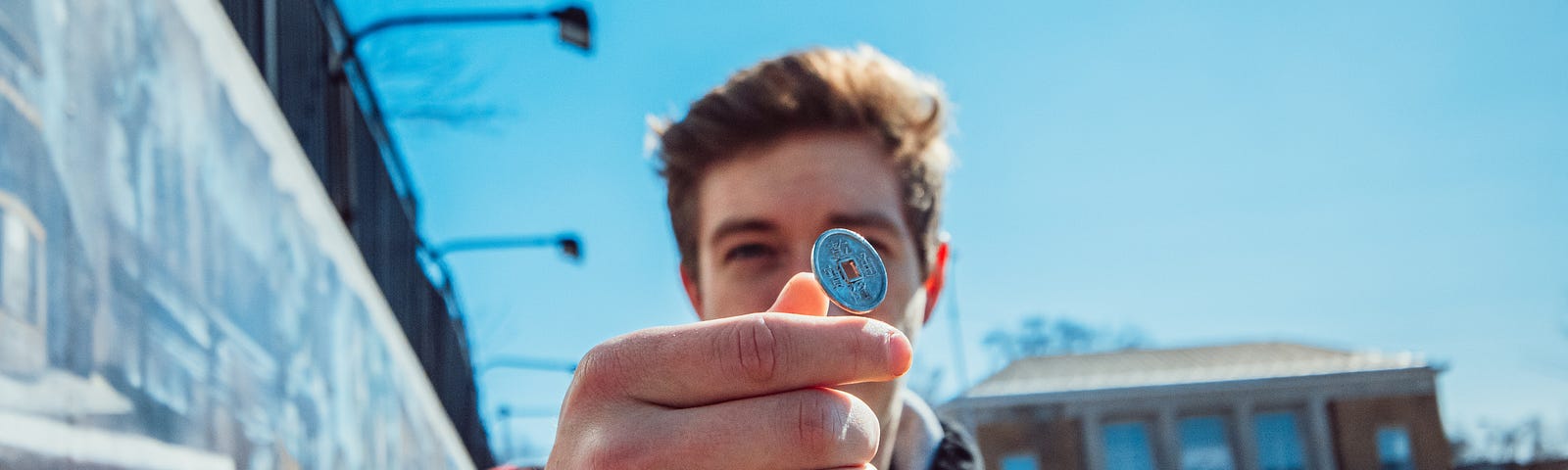 Man Tossing A Coin