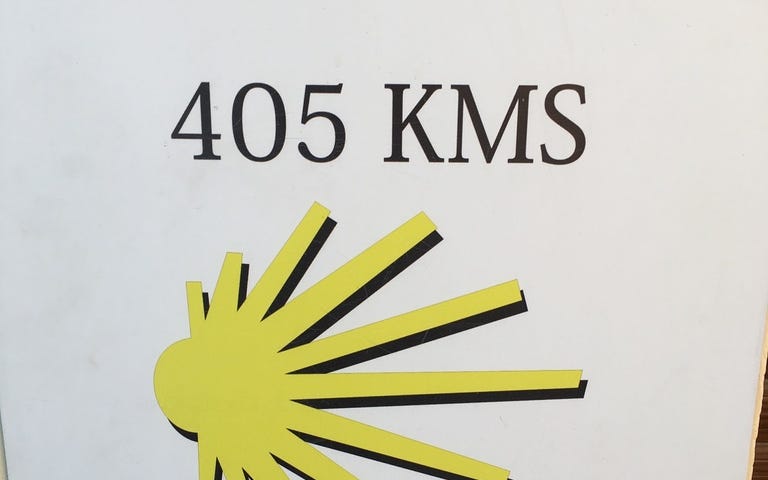 ROAD sign to Santiago, showing 405 kilometers to go.