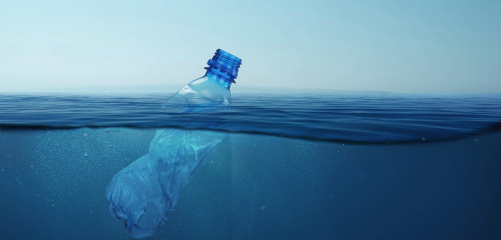 Plastic in the ocean, picture of a floating bottle