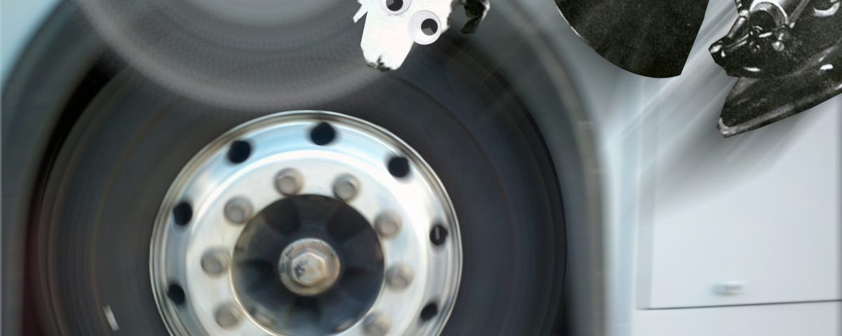 A rapidly spinning bus-wheel; Nipper the RCA dog has caught the wheel and is spinning with it, his eyes crazed; the gramophone he is normally pictured listening to is flying off to the upper right. Image: Kristain Baty (modified) https://flickr.com/photos/50389211@N02/13285976654 CC BY-SA 2.0 https://creativecommons.org/licenses/by-sa/2.0/