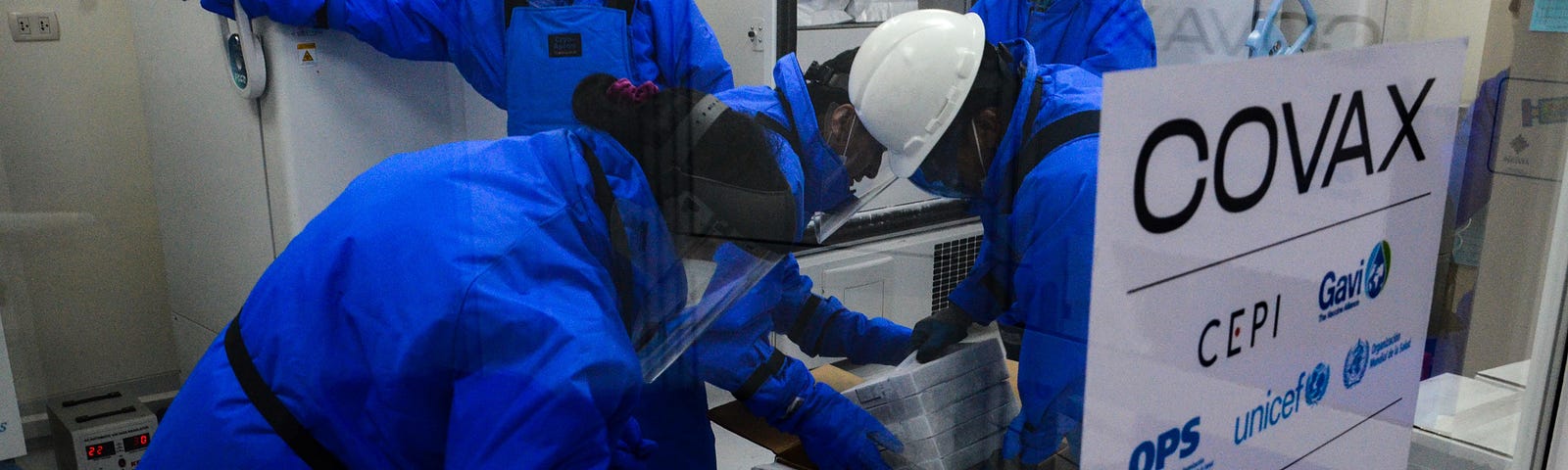 Authorities receive a shipment of COVID-19 vaccines donated by the United States through the U.N. Covax program in La Paz, Bolivia, September 26, 2021. Photo by Josué Antonio Castañeta/Ulan/Pool/Latin American News Agency via Reuters