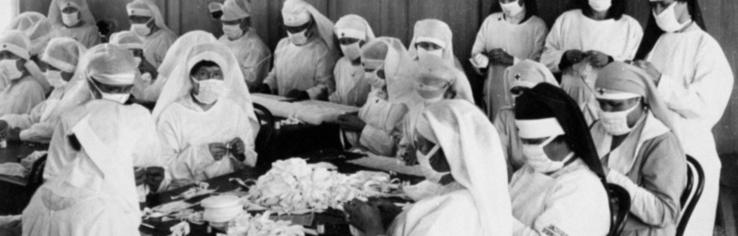 American Red Cross nurses volunteer during the 1918 pandemic flu.