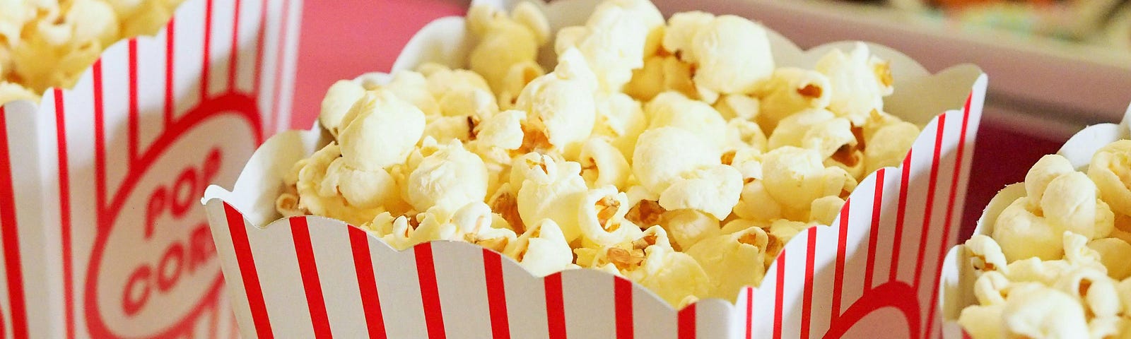 Photograph of a box of theater popcorn.