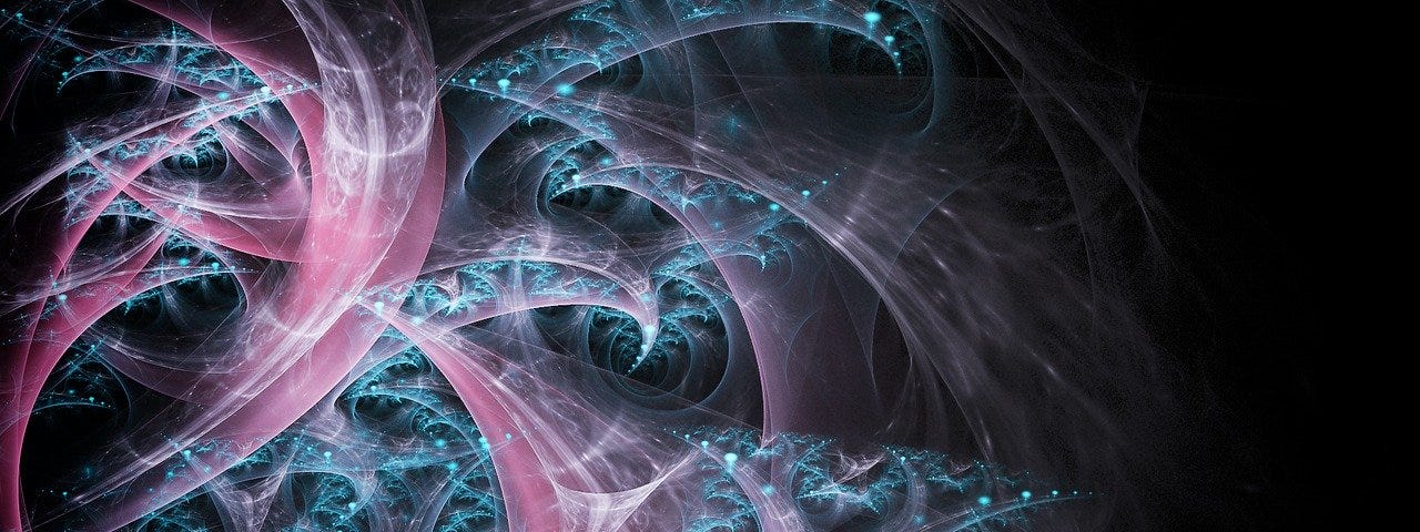 blue and pink fractals on a dark background