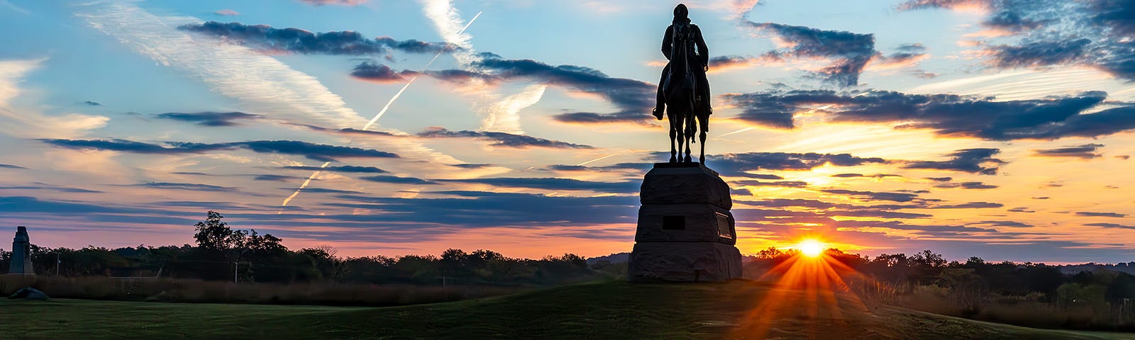 The sun rises over the Gettysburg battlefield.
