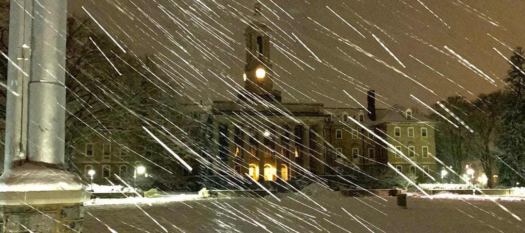 Penn State’s primary administrative building, Old Main, lights up a snowstorm on Wednesday Jan. 23, 2022. For some, this storm was their first experience with snow. (Photo: James Engel)