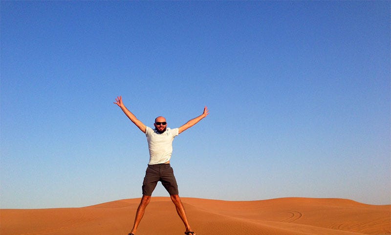 Greg jumping in the desert