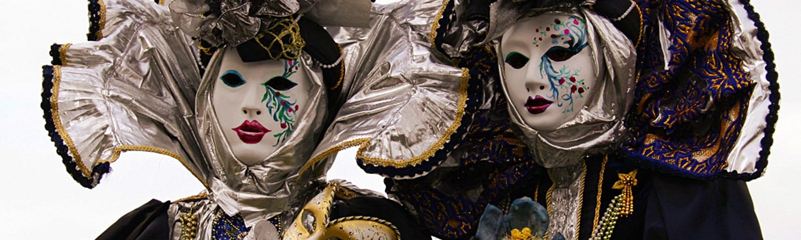 Two masked venetian actors.