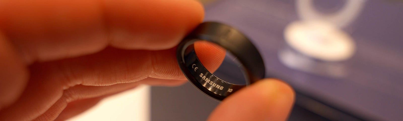 Black Samsung Galaxy ring in Mark Ellis’ hand