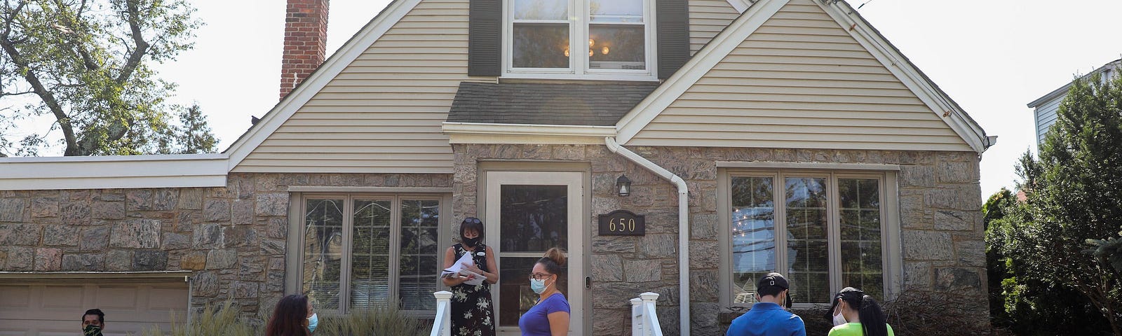 People attend an open house.