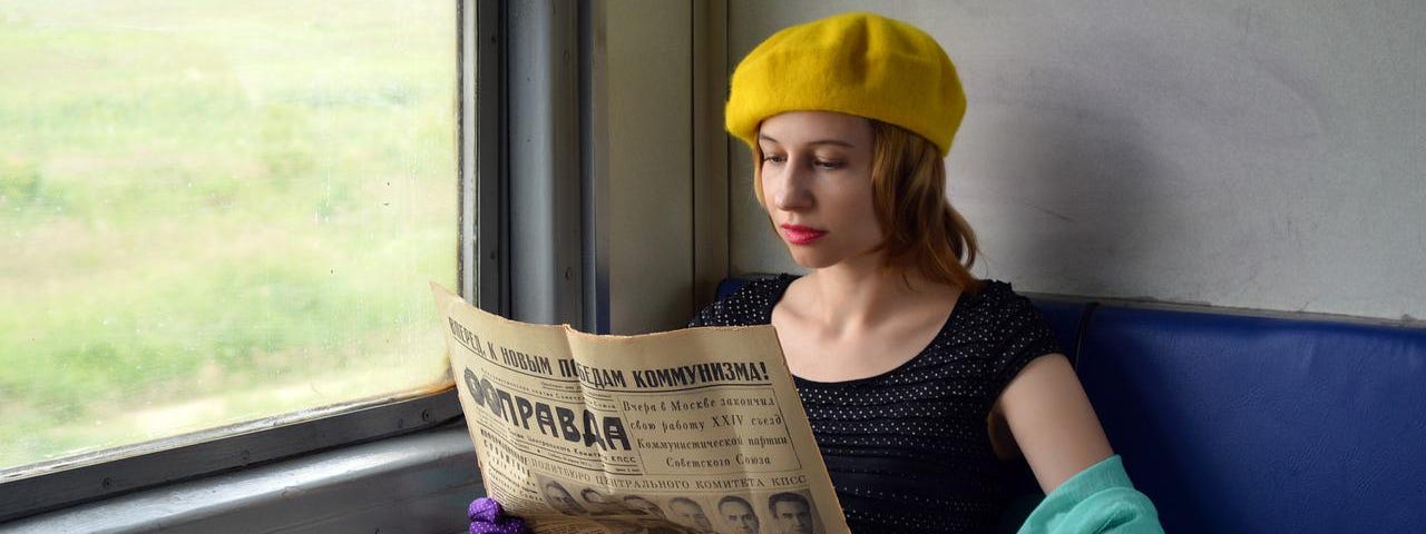 Woman on a train from the 1950s