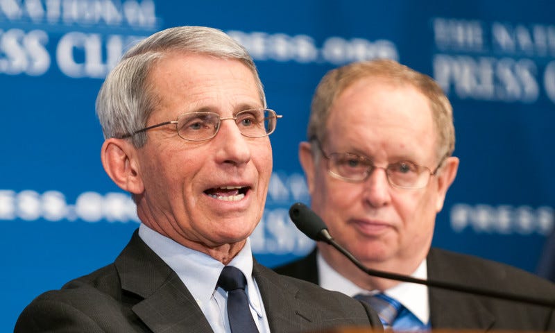 Dr. Fauci speaking at a podium