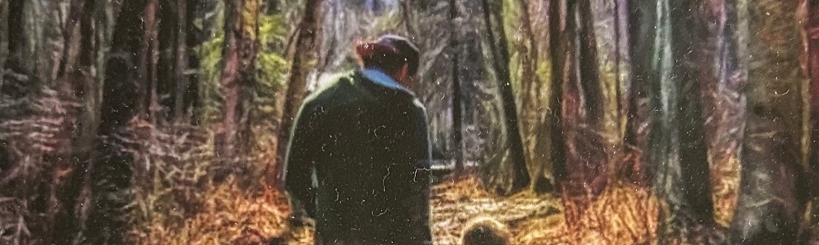 The writer pictures his son and grandson walking in the woods.