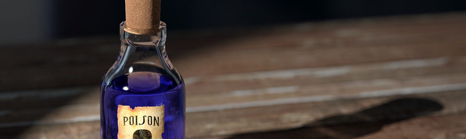 A glass bottle of purple liquid with a label reading “POISON” with a picture of a skull & crossbones.